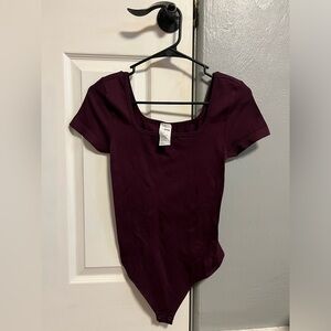 So. Bodysuit in a size medium